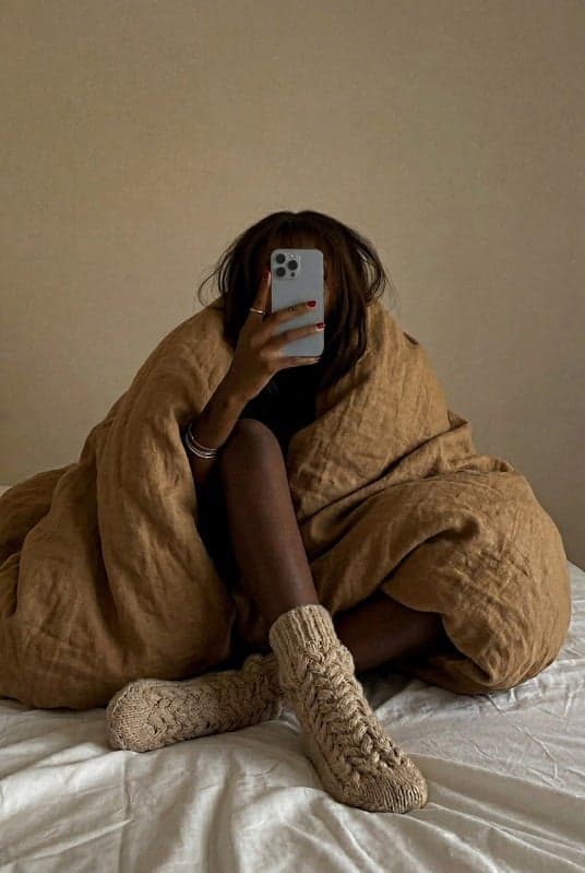 A beauty professional relaxing at home